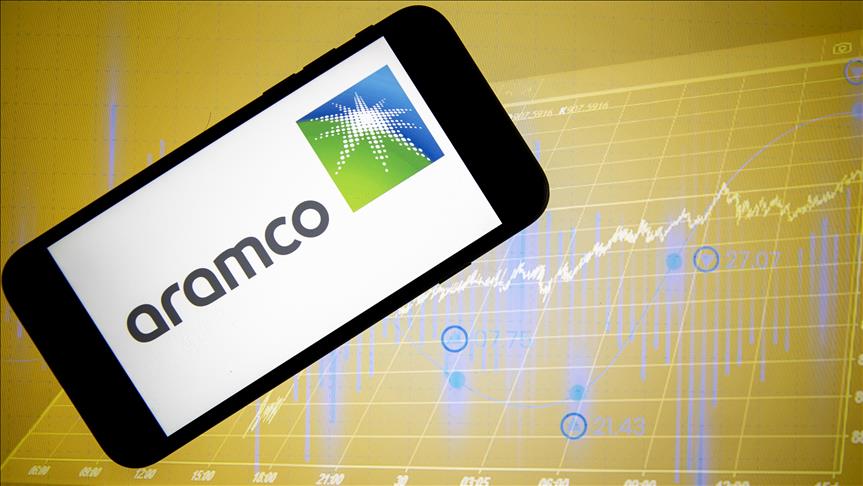 Aramco profit drops with weak oil signaling more strain.